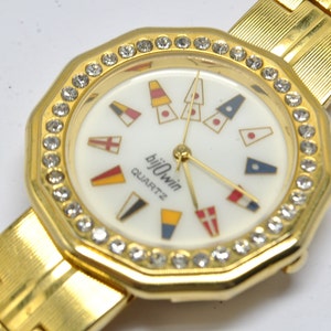 BIJOWIN women's metal watch with 50 rhinestones on case