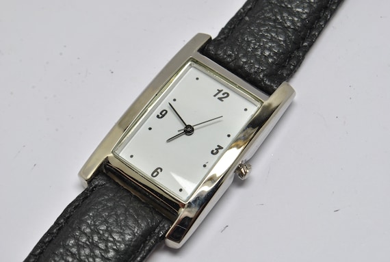 Vintage rectangular chrome watch with 4 numbers o… - image 1