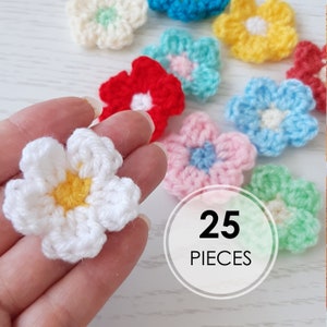Crochet flowers. Decorative elements, appliques. Set of 25 pieces