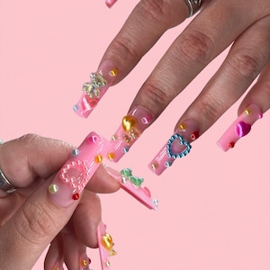 French tip nails| charm nails| pink charm press ons| pink nails| pearl nails| pink pearl nails| nails| press ons