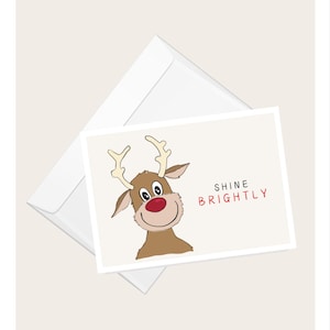 Rudolph The Red Nose Reindeer "Shine Brightly" wenskaart | Humoristische kerstkaart | Elegante blanco notitiekaart