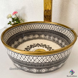Black bathroom sink, with gold rim. handcrafted cylinder shape ceramic sink, hand painted with Moroccan pattern.