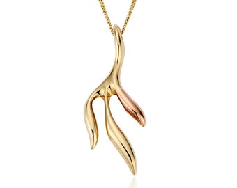 May include: A gold pendant necklace featuring a delicate, abstract branch design. The pendant is crafted from two-tone gold, with a rose gold accent on one of the branches.