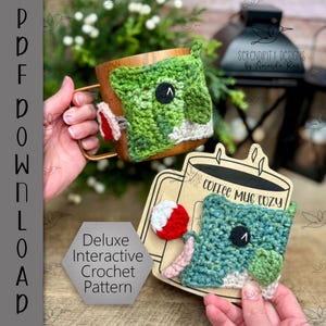 May include: A crochet coffee mug cosy pattern featuring a green and white design with a red and white accent. The pattern is called "Deluxe Interactive Crochet Pattern" and is by "Screndipity Designs by Amanda Ray".