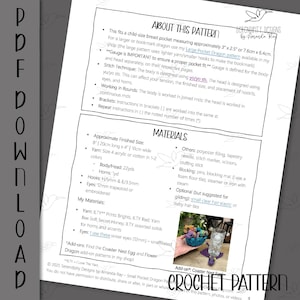 May include: A crochet pattern sheet with text, including "About This Pattern" and "Materials." The pattern is for a child-size breast pocket dragon, approximately 3" x 2.5". The sheet includes instructions, yarn details, and hook sizes.