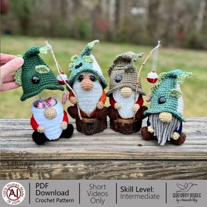 May include: Four handmade crochet gnomes with fishing poles and hats. The gnomes are in various colours, including green, brown, red, and white. One gnome is holding a fish. The text "SERENDIPITY DESIGNS by Amanda Ray" is visible.