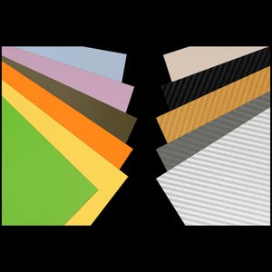 May include: A collection of colorful patterned fabric samples, including green, yellow, orange, brown, pink, and blue. The samples are arranged in a fan shape on the left side of the image. On the right side of the image, a collection of patterned fabric samples in black, gray, white, and brown are arranged in a similar fan shape.