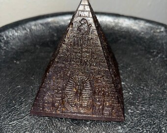 Pyramid candle. Egyptian candle.