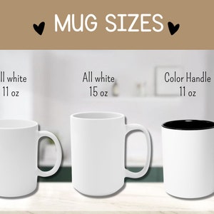May include: Three white ceramic mugs with different sizes and styles. The mug on the left is 11 oz and all white. The middle mug is 15 oz and all white. The mug on the right is 11 oz with a color handle.
