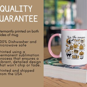 May include: White ceramic mug with a pink interior and handle, featuring a Halloween design and the text "'tis the season". The design includes a witch, skull, pumpkin, and other spooky elements.