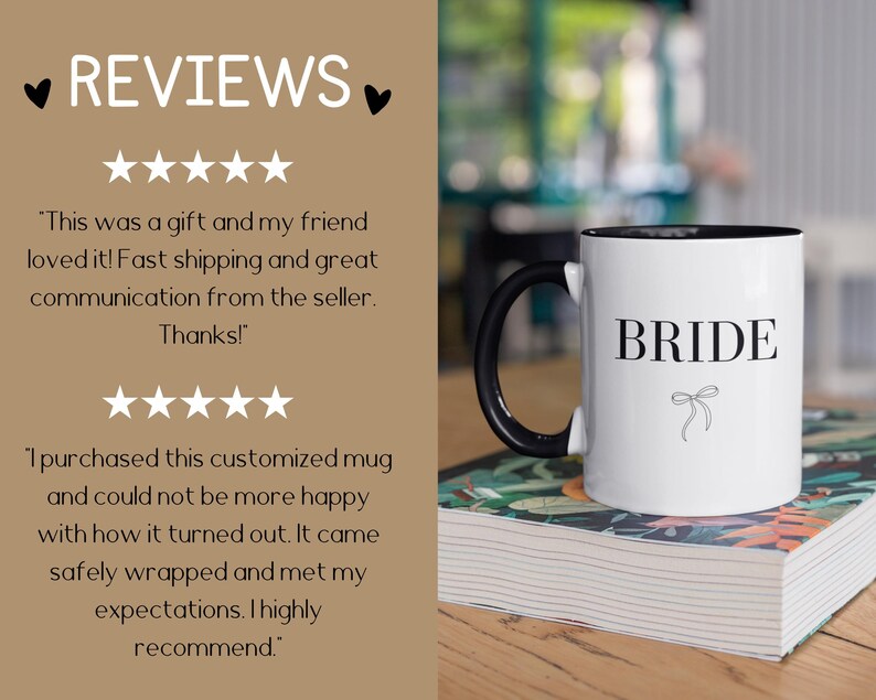 May include: White ceramic mug with a black handle and black rim. The mug has the word "BRIDE" printed in black letters with a small black bow underneath. The mug is sitting on a book with a floral pattern.