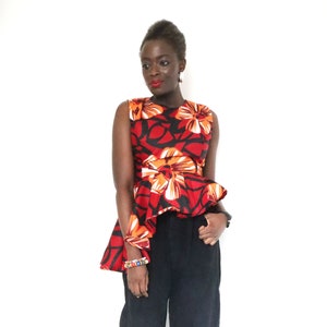 Asymmetrical peplum top plus size top
