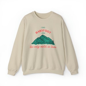 The Babyfoot Inn The Only Motel in Town Search Party HBO Dory Seif Unisex Heavy Blend Crewneck Sweatshirt