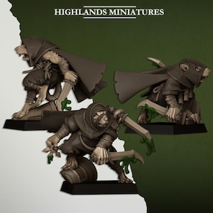 May include: Three miniature figures of anthropomorphic rat-like creatures in hooded cloaks, each holding a dagger. The figures are posed in action, with one leaning on a barrel. The text "HIGHLANDS MINIATURES" is at the top.