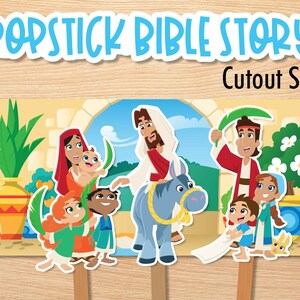 May include: A colorful Popstick Bible Story Cutout Set featuring illustrated characters and scenes. The set includes figures of Jesus on a donkey, children, and other biblical figures, all mounted on wooden sticks.