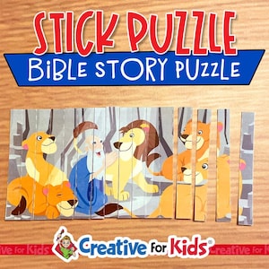 May include: A "Stick Puzzle" depicting a Bible story with lions and a man in a blue robe. The puzzle is made of vertical strips and includes the text "BIBLE STORY PUZZLE" in blue and red. The brand name "Creative for Kids" is at the bottom.