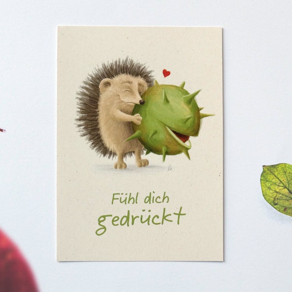 Postkarte "Fühl dich gedrückt" mit Igel und Kastanie