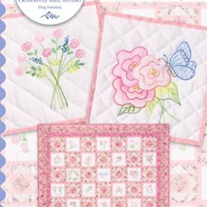 May include: A quilt pattern for a pink and white quilt with a floral design. The pattern includes instructions for blocks 1 and 2, as well as quilt assembly. The pattern is titled "Hope Blooms".