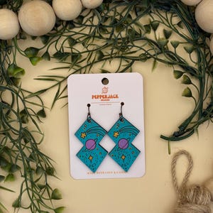 Handcrafted Cosmic Blue Geometric Earrings – Laser Cut Space Design with Planets and Stars