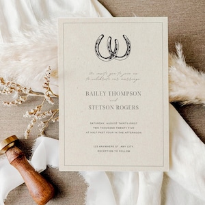 May include: A rustic wedding invitation with a brown background and a black and white illustration of two horseshoes. The text reads "We invite you to join us to celebrate our marriage Bailey Thompson and Stetson Rogers Saturday, August Thirty-First Two Thousand Twenty Five at Half Past Four in the Afternoon 123 Anywhere St. Any City. Reception to Follow"