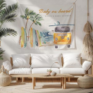 May include: A white tapestry with a watercolor illustration of a yellow van with surfboards on top. The van is driving on a beach with palm trees and waves. The text "Baby on board" and "Macey's Baby Shower" is written on the tapestry.