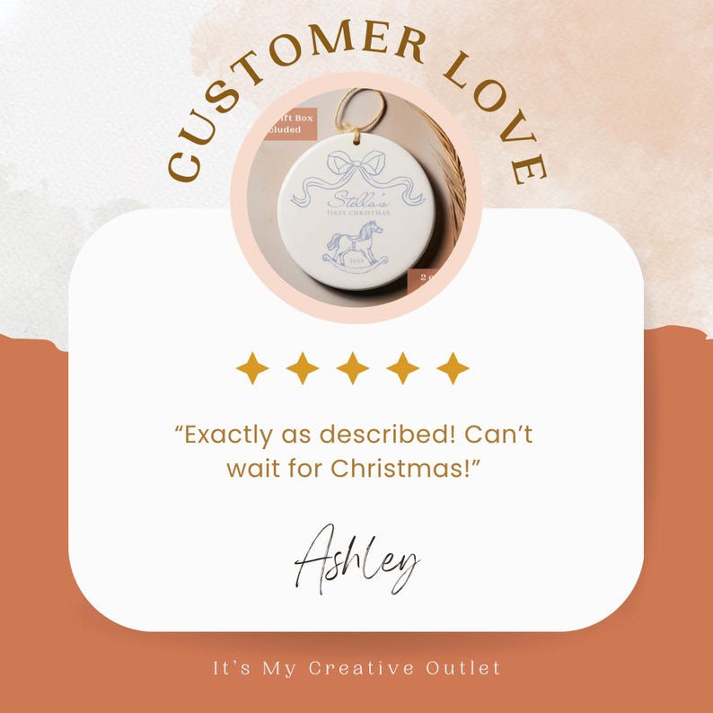 May include: A white ceramic Christmas ornament with a blue rocking horse design and the text "Stella's First Christmas". The ornament is round and includes a gold string for hanging. The background is a peach color with the words "Customer Love".