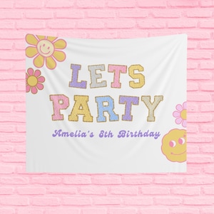 May include: White fabric banner with the words "LETS PARTY" in pastel colors and gold glitter trim. The text "Amelia's 8th Birthday" is below. The banner is decorated with flower and smiley face graphics.