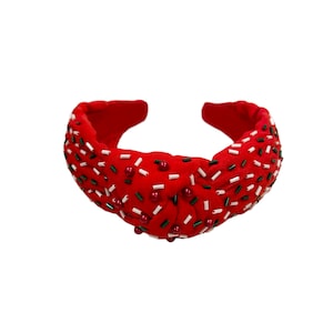 Diadema con nudo navideño adornada