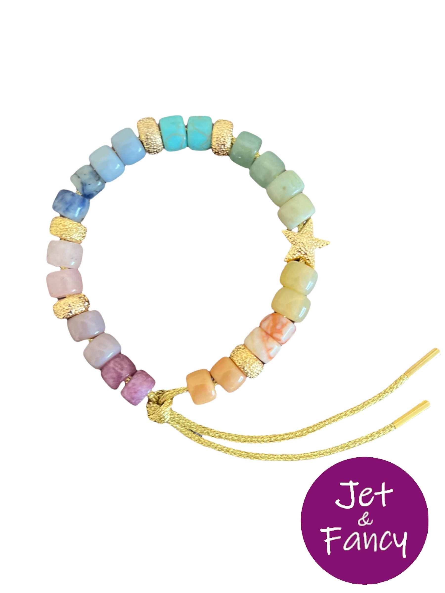 Pulsera de cuentas de poni con piedras naturales grandes multicolor, estrella con acabado florentino en piedra dorada y rondeles sobre cordón de lurex.
