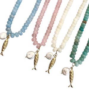 Natural stone rondellle shape adjustable necklace with fresh water pearl and gold tone fish charm