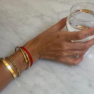 Braccialetto con filo rosso portafortuna, protezione e benedizione