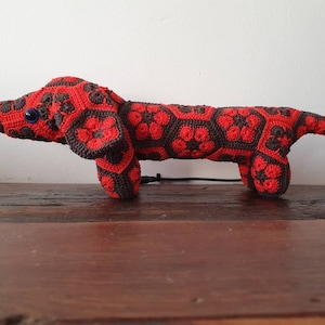 African flower crochet sausage dog