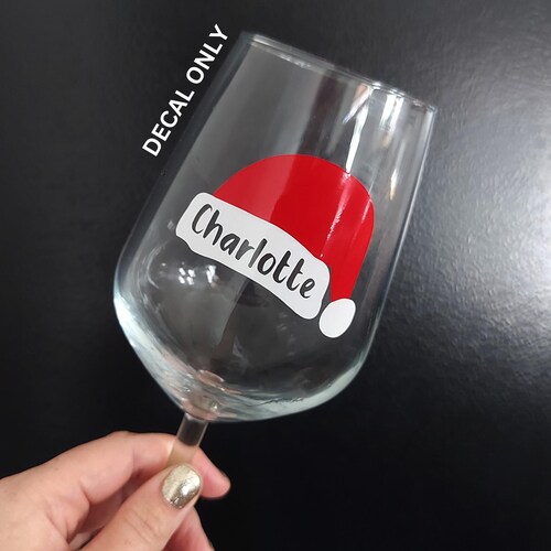 Vinilo adhesivo personalizado con nombre y gorro de Papá Noel / Adhesivo navideño con nombre, pegatina para cristal, pegatina navideña, adhesivo navideño, adhesivo para copa de vino