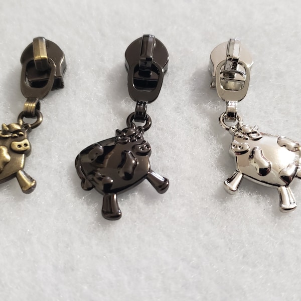 Cow Zipper Pulls, Silver Cow Pulls, Gunmetal Cow Pulls, Brushed Antique Zipper Pulls, Nylon Zipper Pulls, Purse Hardware, Handbag Hardware.