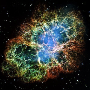 May include: A vibrant nebula with intricate, swirling patterns of red, green, and blue. The nebula is surrounded by a field of stars.