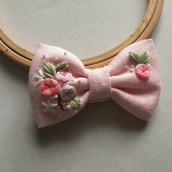 Premium Photo | A little girl with a hair bow in her hair