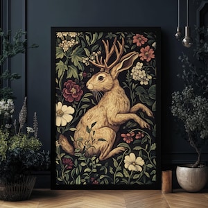 May include: A vintage-style illustration of a brown rabbit with antlers, surrounded by a lush garden of pink, white, and green flowers. The rabbit is sitting on its haunches, with its head turned to the side. The background is a dark green, creating a dramatic contrast with the bright colors of the flowers.