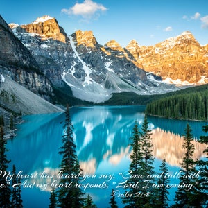 May include: A scenic view of a mountain lake with snow-capped peaks and lush green trees. The water is a vibrant blue and reflects the sky and clouds. The text "My heart has heard you say, "Come and talk with me." And my heart responds, "Lord, I am coming." Psalm 27:8" is superimposed on the image.