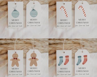 May include: A set of eight rectangular white paper gift tags with string loops. Each tag features a holiday graphic including a blue ornament, a red and white candy cane, a gingerbread person, or two socks, with the text MERRY CHRISTMAS! from Emma and Jonah.