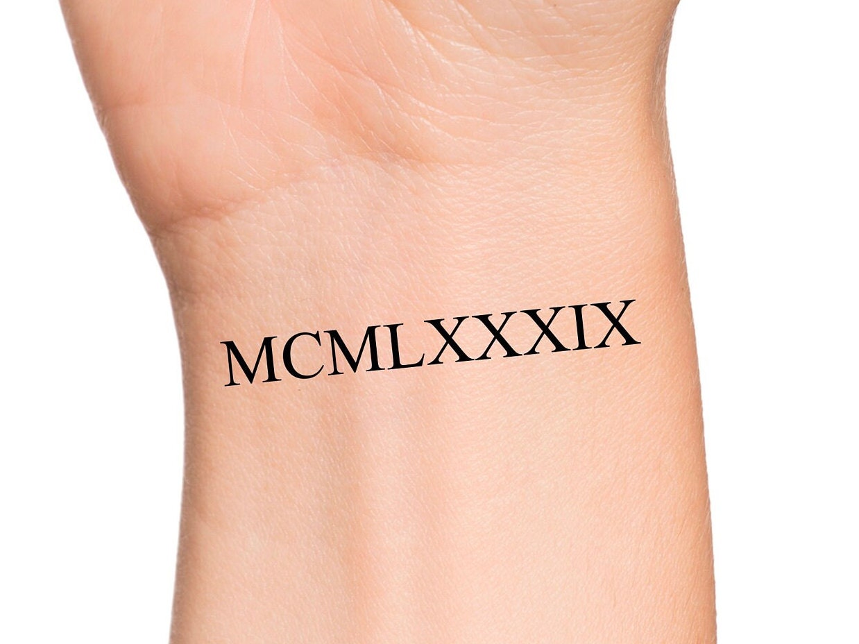 7. "2019 Roman Numerals Tattoo on Wrist" - wide 4