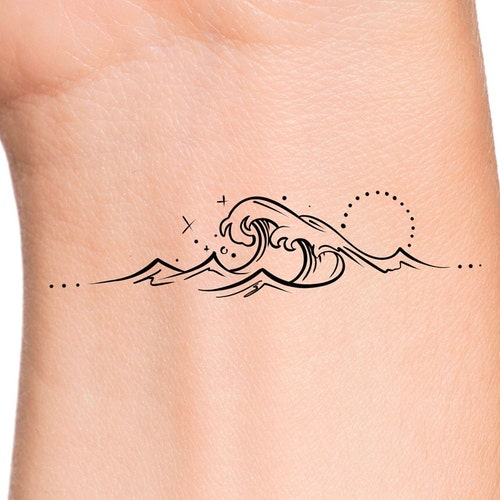 Sun n moon tattoo with waves for  Xpose Tattoos Jaipur  Facebook