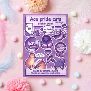 May include: A sticker sheet featuring ace pride cats and dogs. The sheet includes a variety of stickers with different designs, including cats wearing ace pride flags, a cat holding a baseball bat, and a cat riding a skateboard. The text on the sheet reads "Ace pride cats & dogs" and "Made by @mona_mauve".