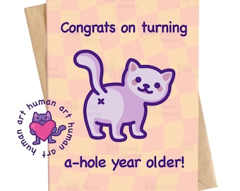 May include: A greeting card with a light purple cat illustration and the text "Congrats on turning a-hole year older!" The card has a pink and yellow checkered background and is inside a brown envelope. A logo with a cat holding a heart is in the lower left corner.