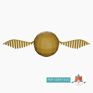 Pode incluir: Uma representação geométrica dourada do Pomo de Ouro, um objeto esférico com duas asas. As asas são feitas de barras verticais. A imagem inclui o texto "PDF | DXF | SVG" e um logotipo.