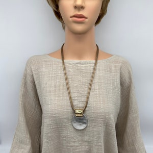 Lovely gold and silver sweater necklace