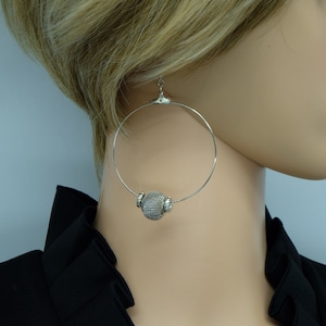 Large hoop earring. Large stylish statement earrings