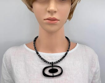 Short ethnic corded necklace with black pendant
