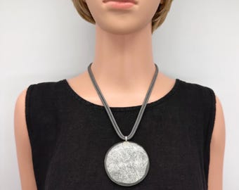 Large resin pendant grey faux suede cord