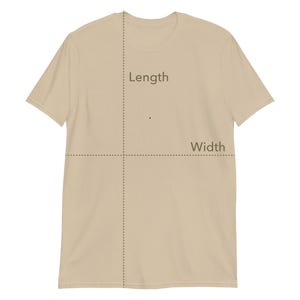May include: A tan-colored t-shirt with the words "Length" and "Width" overlaid on the shirt. Dotted lines indicate measurement points. The shirt is made of a soft material and has short sleeves.