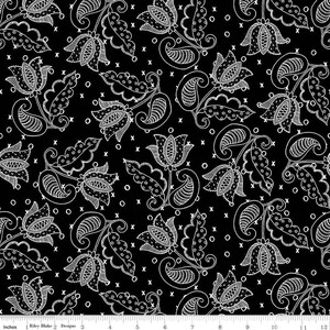 May include: Black fabric with a white floral pattern. The pattern features stylized flowers, leaves, and paisley shapes. The fabric is designed for quilting and crafting.